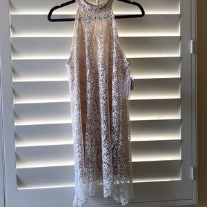 White crochet boho style dress. Much prettier in person. Unique.